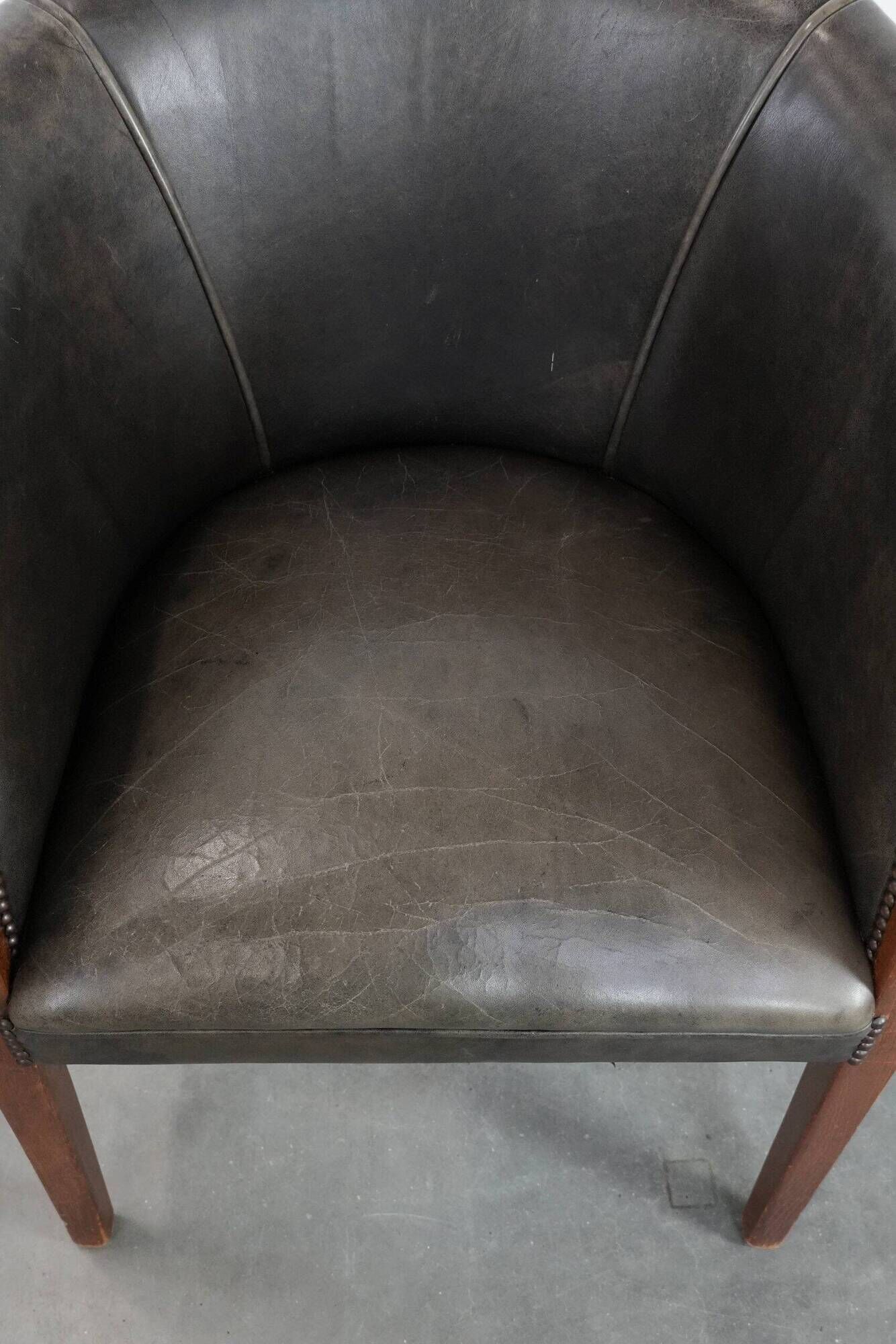 Amazing cow leather and wooden tub chair / side chair