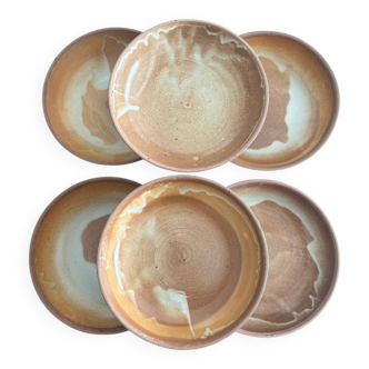 A lot of vintage 1970s ceramic beige stoneware deep plates, handmade.