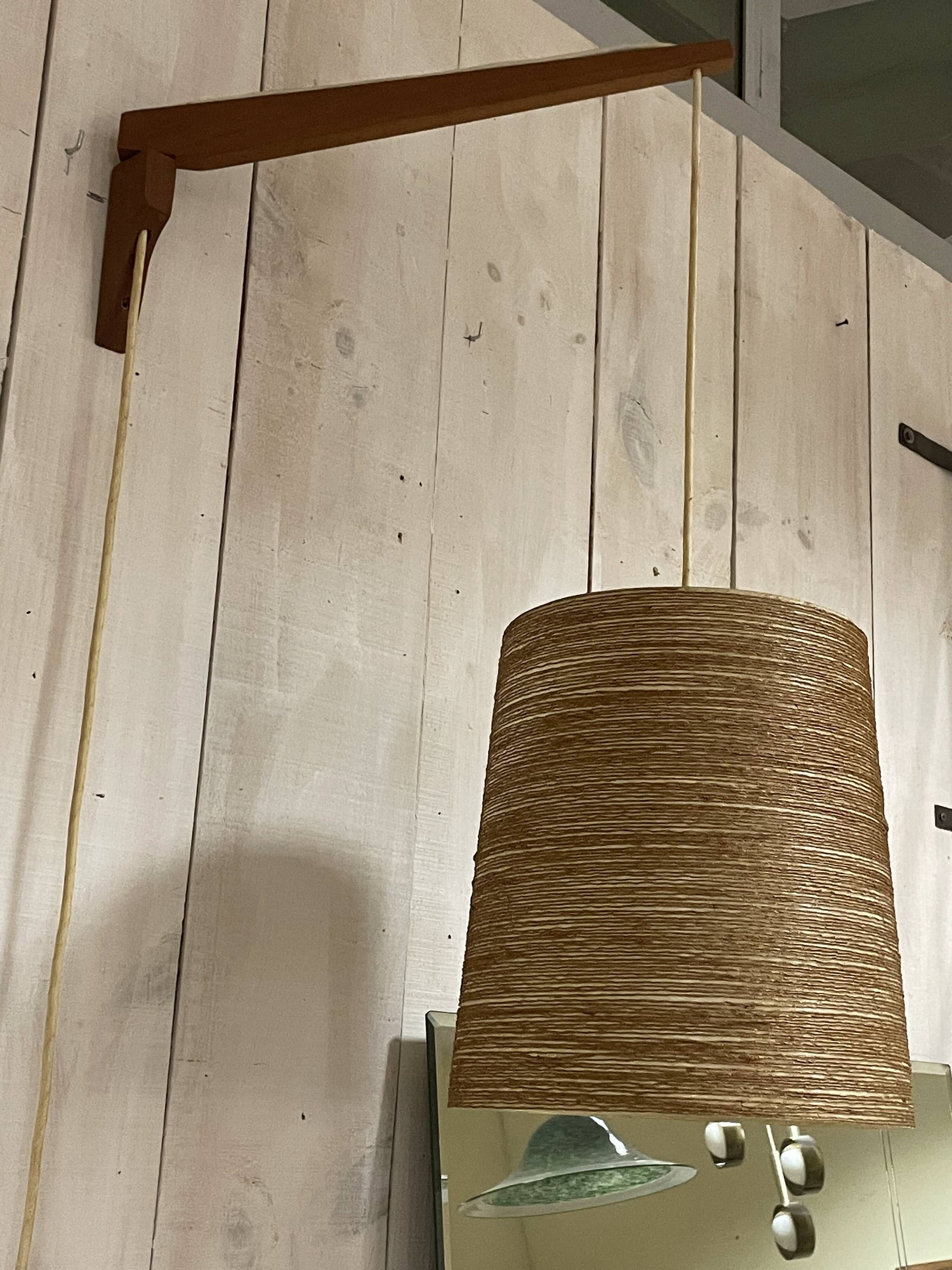 Rare teak and sisal wall lamp from the 1960s, attributed to Lotte Bostlund.