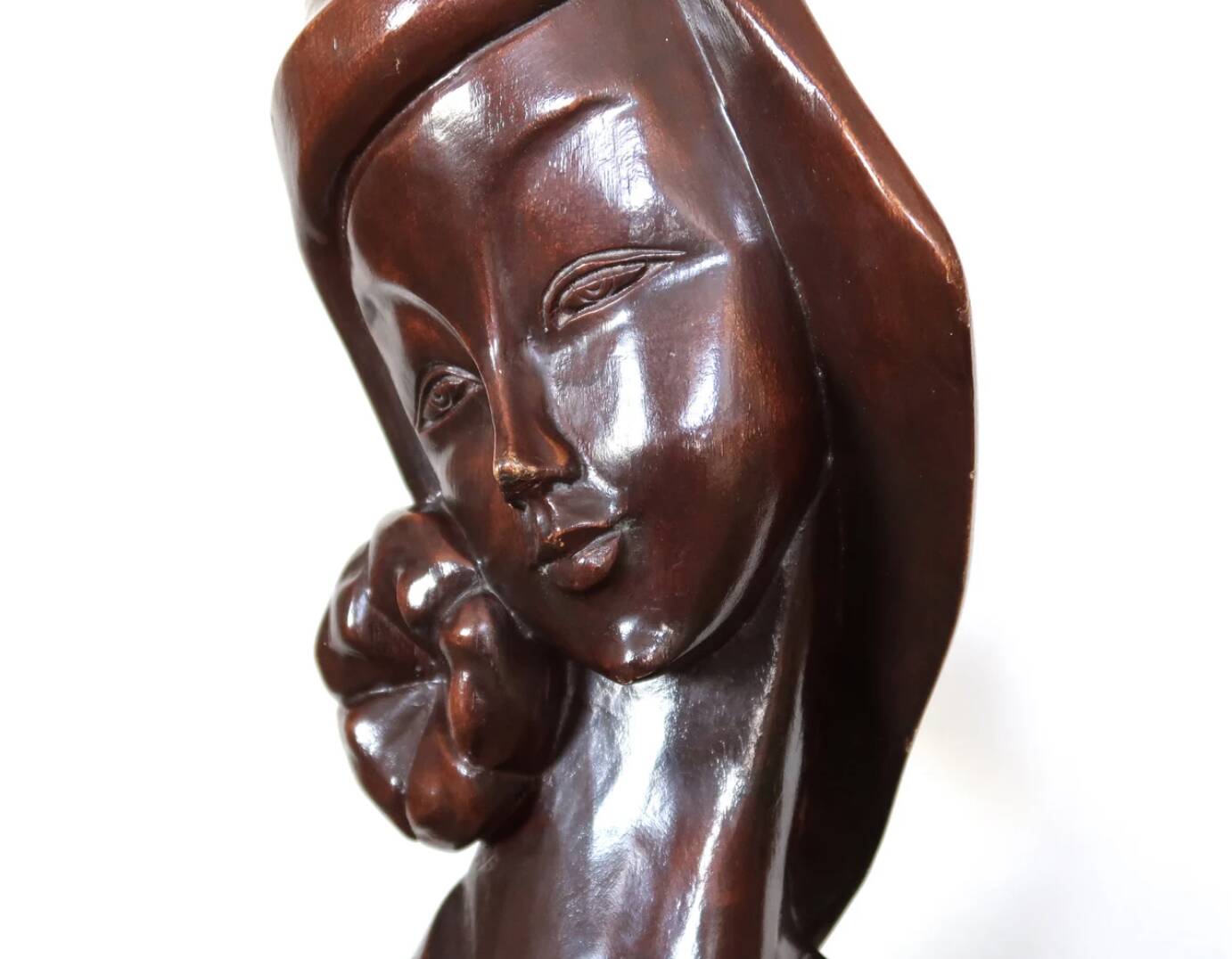 Wooden sculpture of a woman with a flower, 1970s
