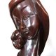 Wooden sculpture of a woman with a flower, 1970s
