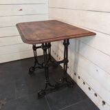 Bistro table with cast iron legs and oak top