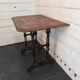 Table bistrot pied fonte dessus chêne