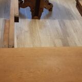 Oval wooden table with extensions