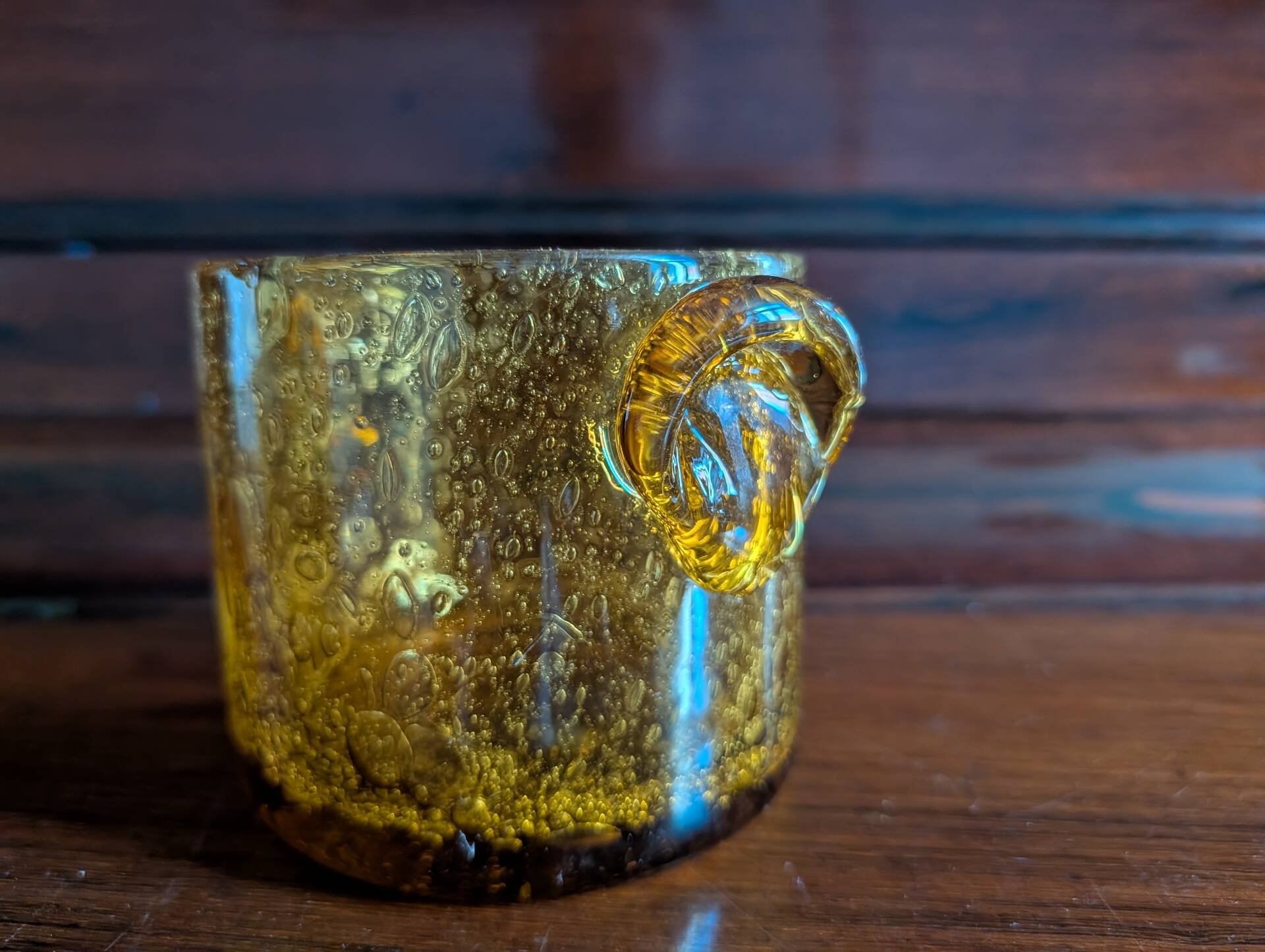 Small vase or amber bubbled glass tealight holder