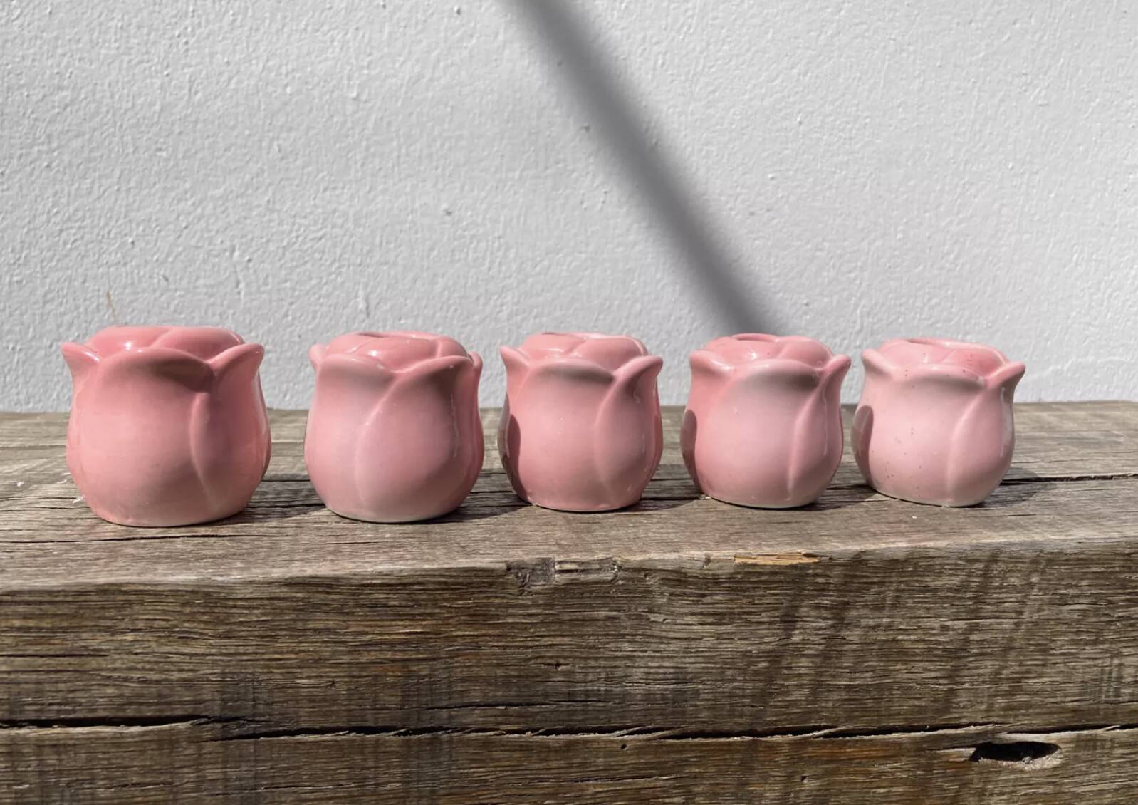 Set of pink flower ceramic candle holders