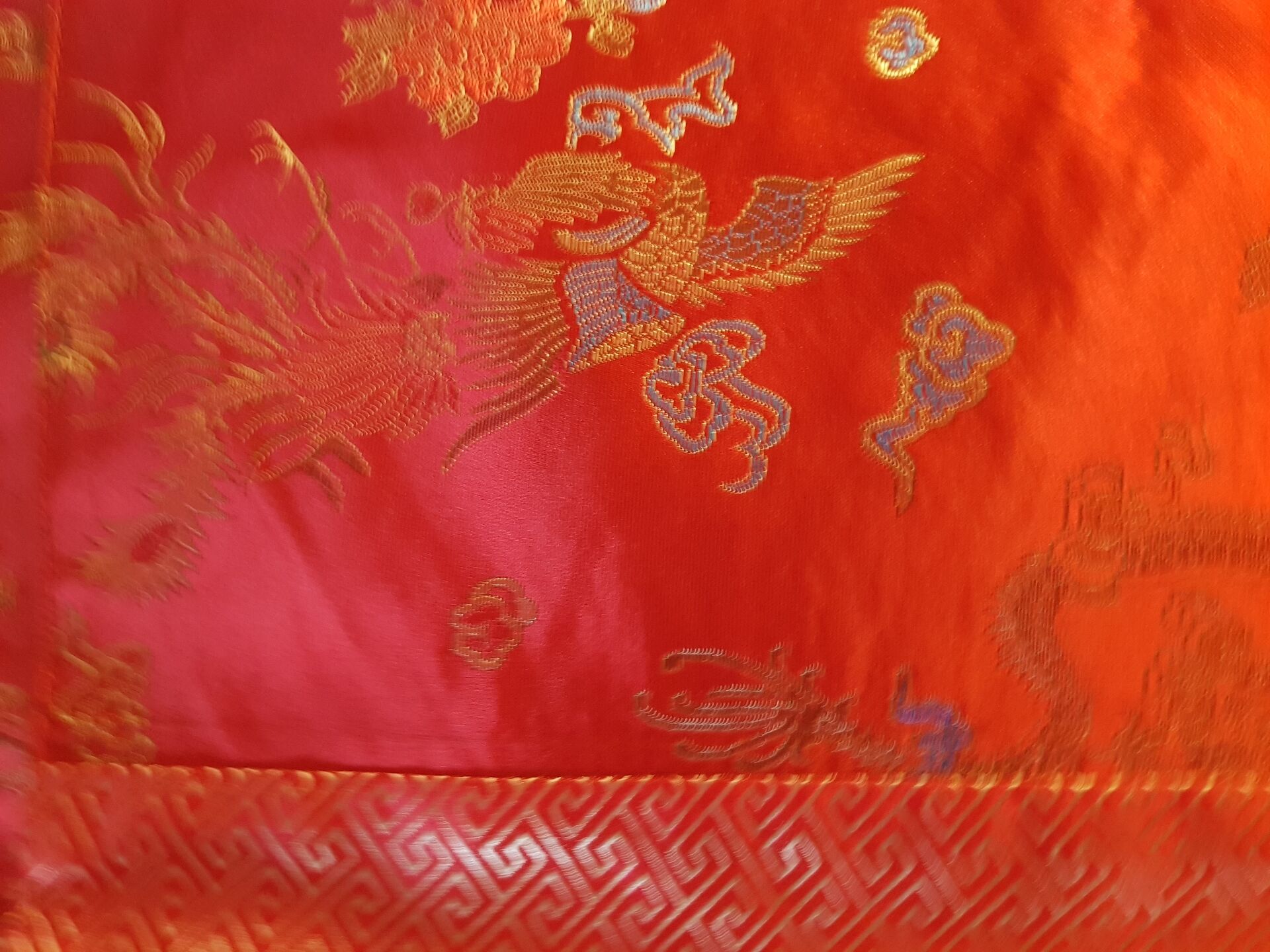 Set of 6 small table napkins in red brocade.