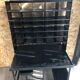 Old black metal postal sorting furniture + 30 perforated lockers + vintage stool