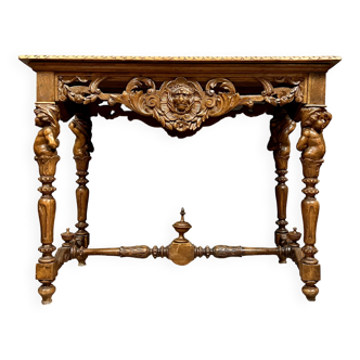 Rare et muséale table de milieu Renaissance aux chérubins en noyer sculpté milieu du 19ème siècle