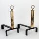 Paire de chenets par Jacques Adnet