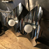Pair space Age chrome metal wall appliques