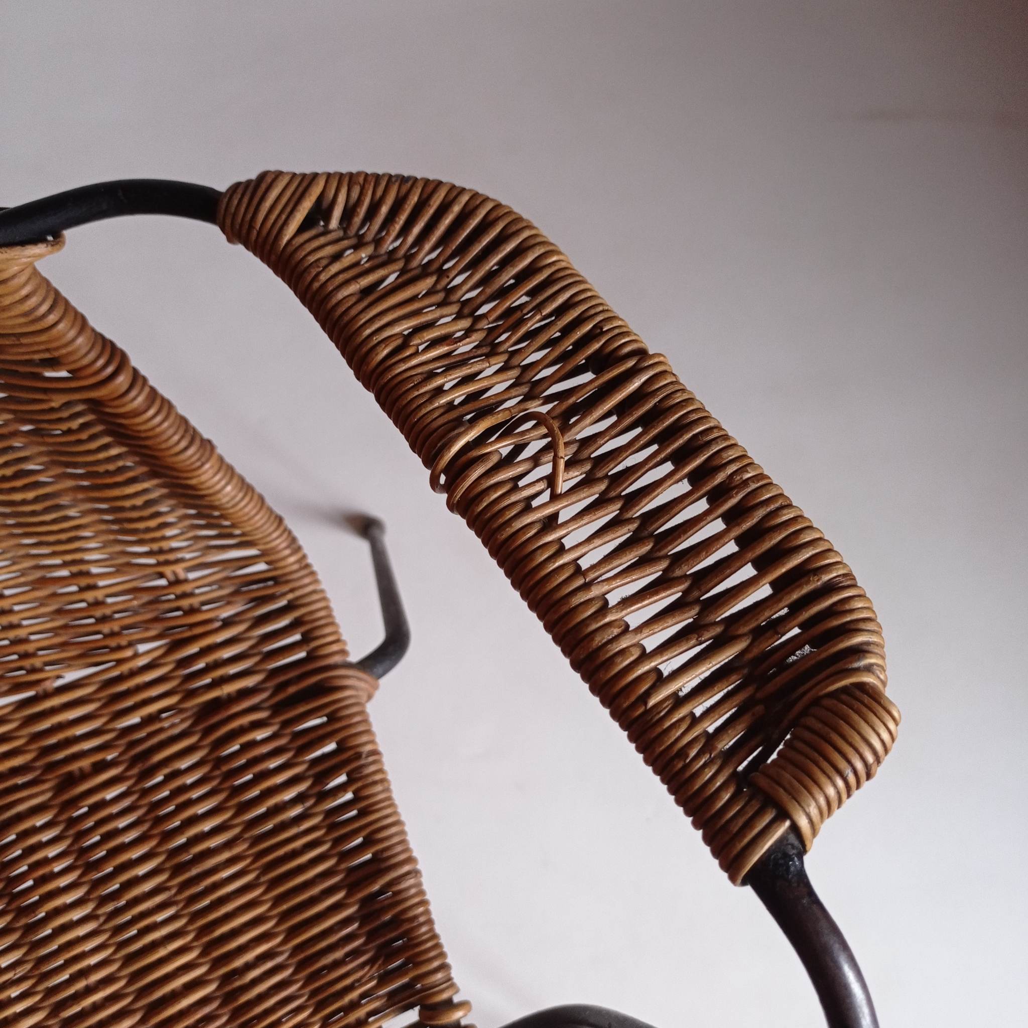 Wicker chair with Campo and Graffi armrests from the 60s.