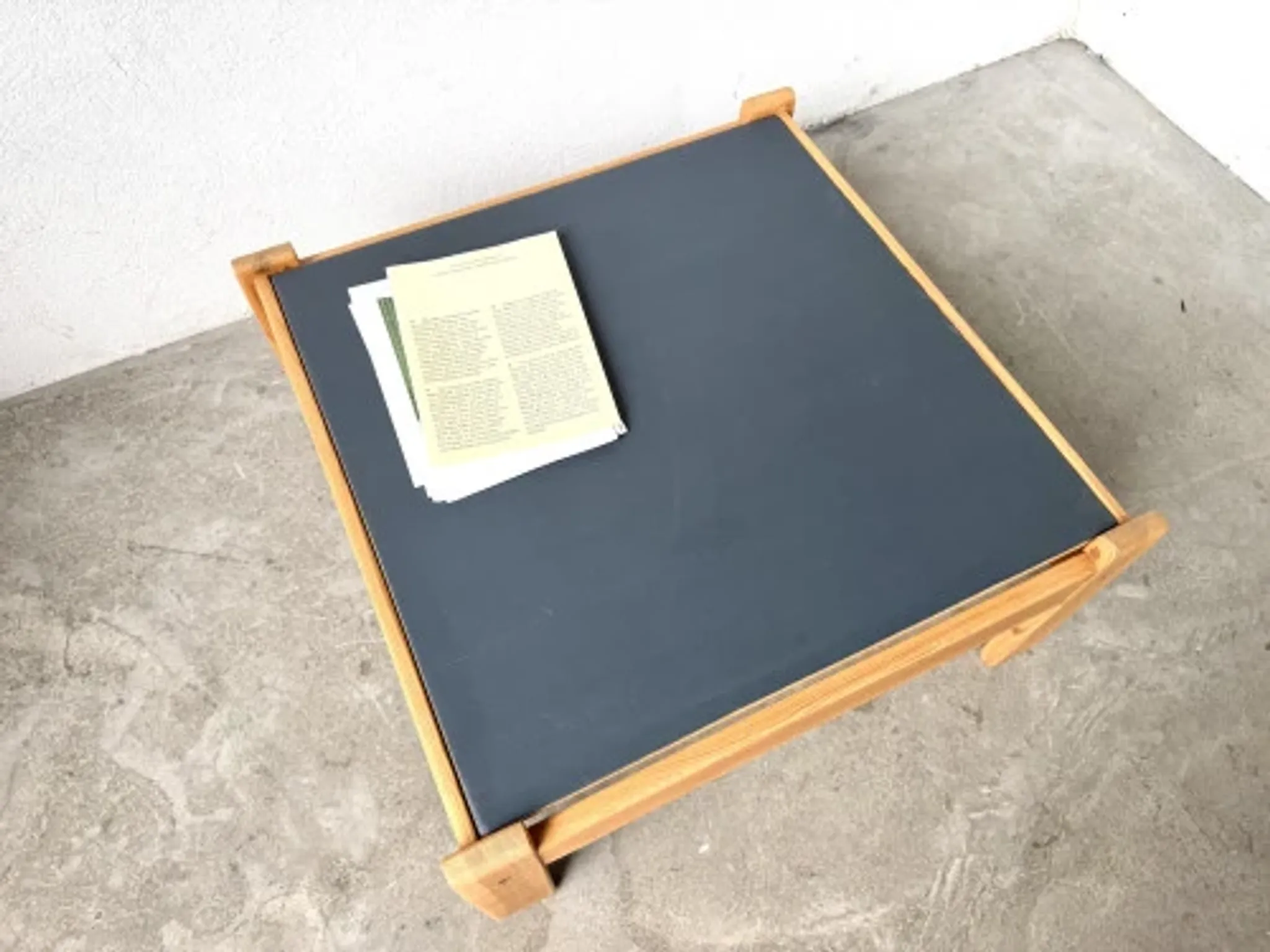 Modernist coffee table in solid pine with a reversible top, 1970s.