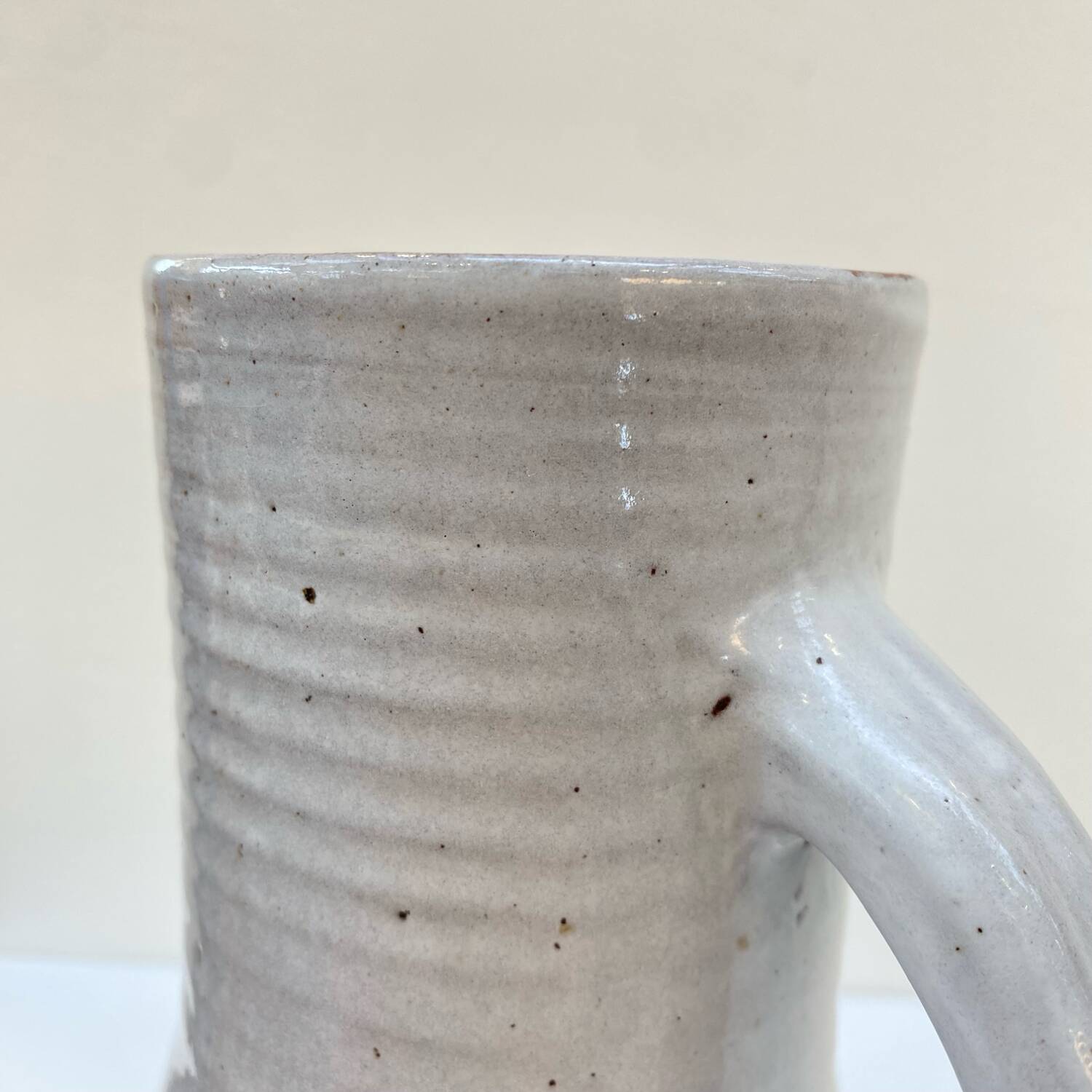 Enameled stoneware pitcher by Jeanne and Norbert Pierlot