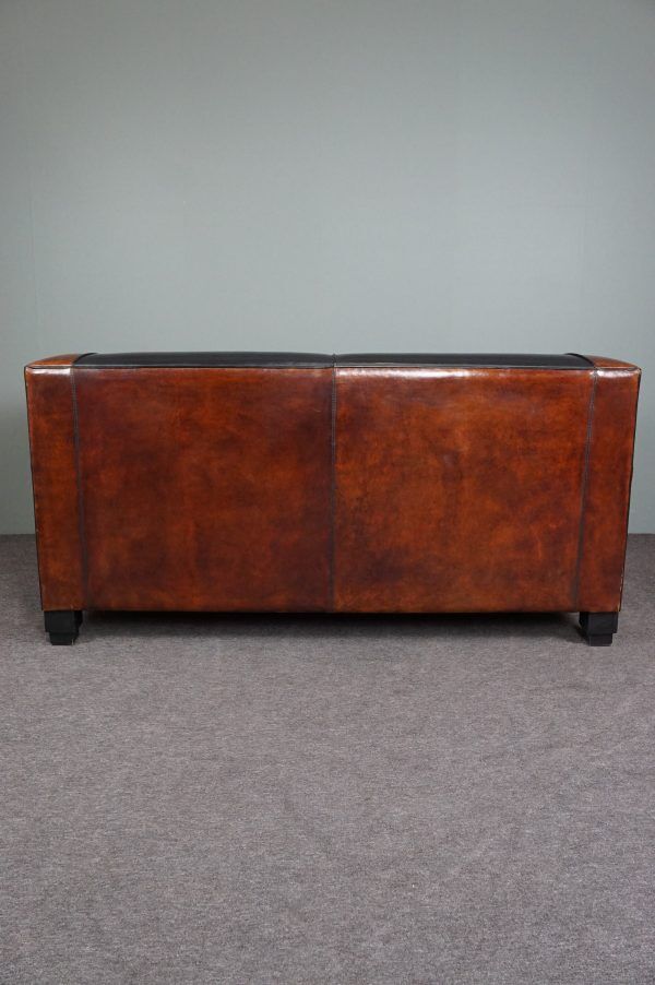 2.5-seater art deco style sofa in sheepskin