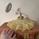 Vintage tilting wall light in gold Clichy glass