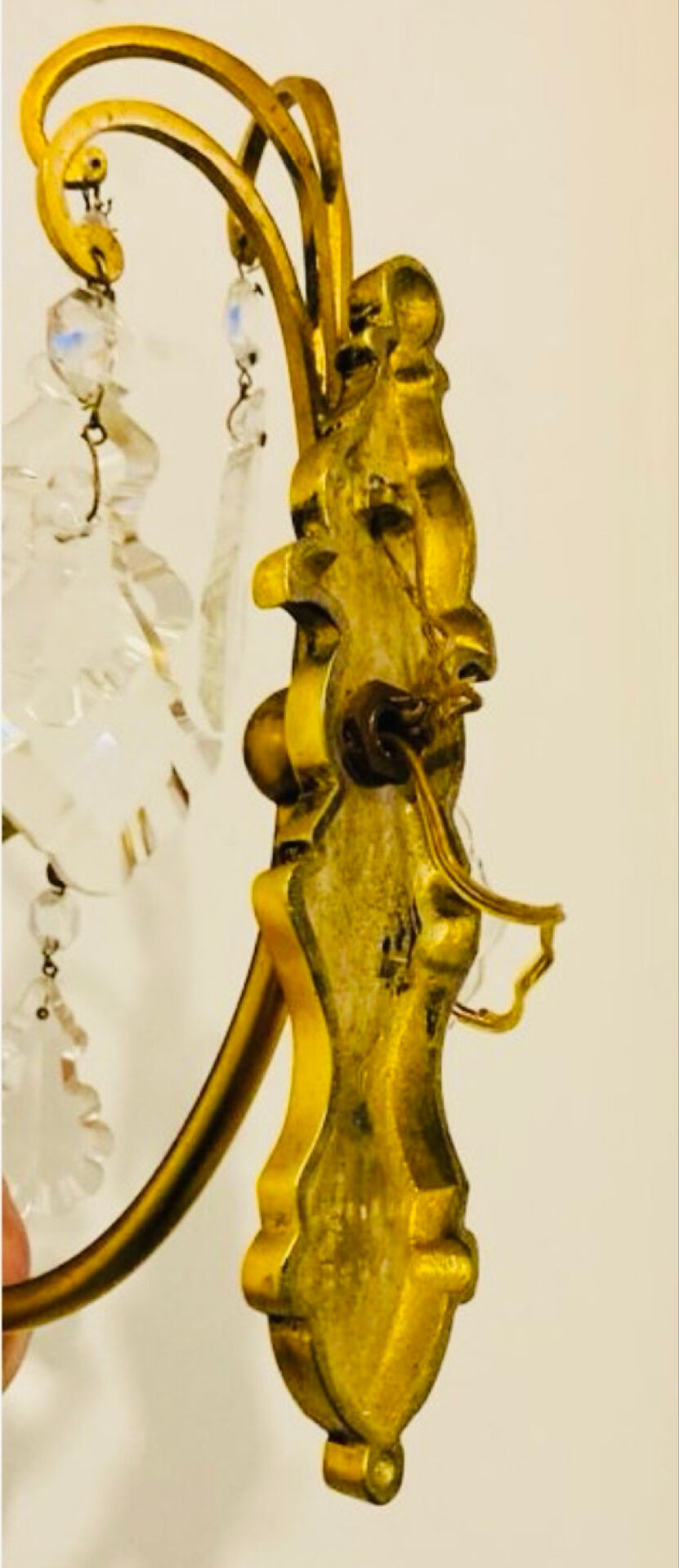 Brass wall light with glass pendants from the mid-20th century.