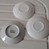Trio of mismatched white cups