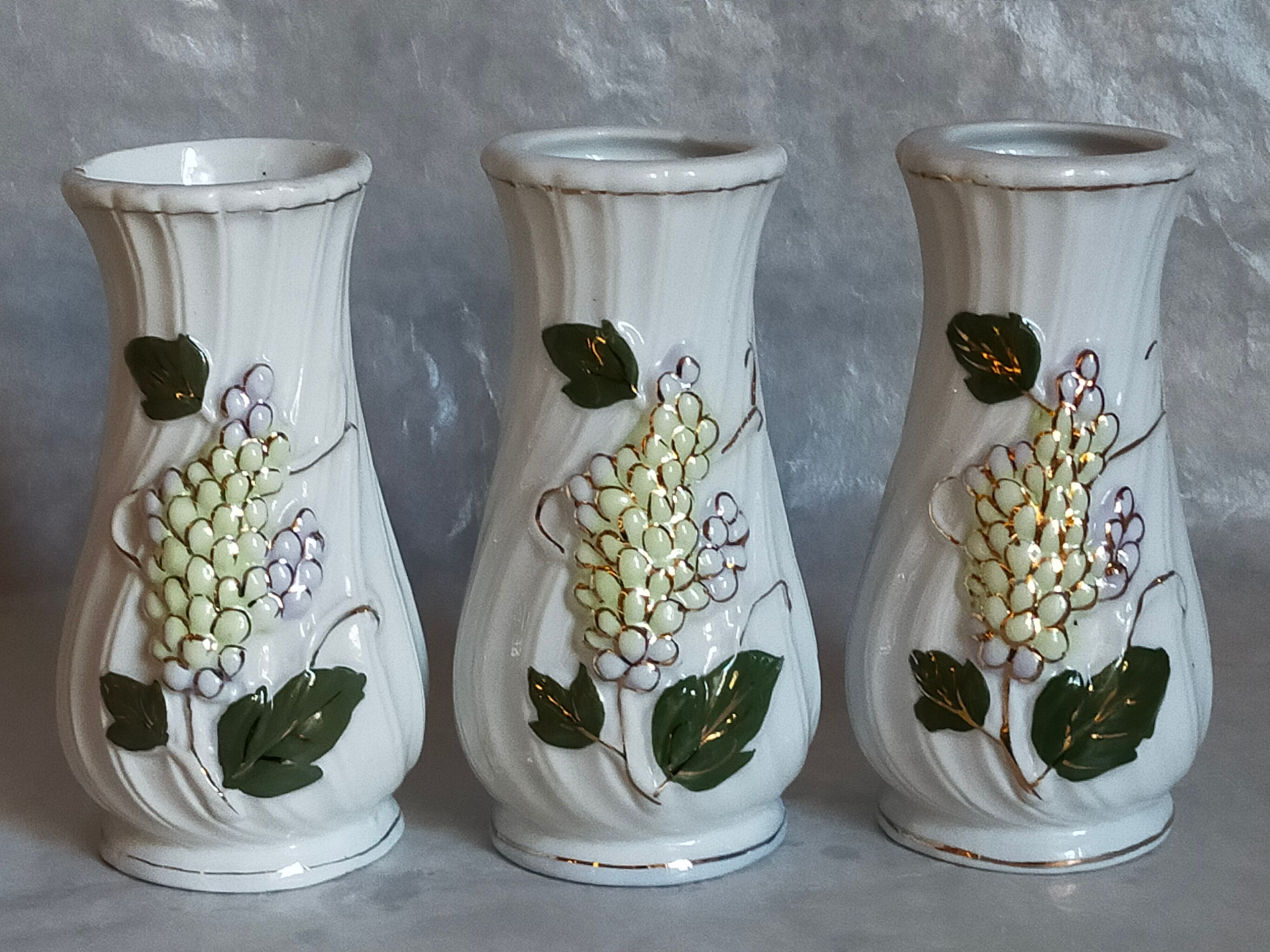 Three ancient lilac slurry vases