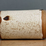 Enamelled sandstone milk jar, signed