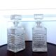 Pair of vintage diamond-cut whiskey decanters