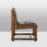 Pair of oak armchairs, upholstered in leather. Work from the 1960s.