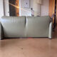 Two-seater Maralunga sofa in olive green leather.