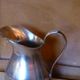 Coffee set in silver metal composed of 3 pitchers, Millan Freres, Paris