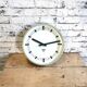 Beige industrial bakelite wall clock from Pragotron, 1970s