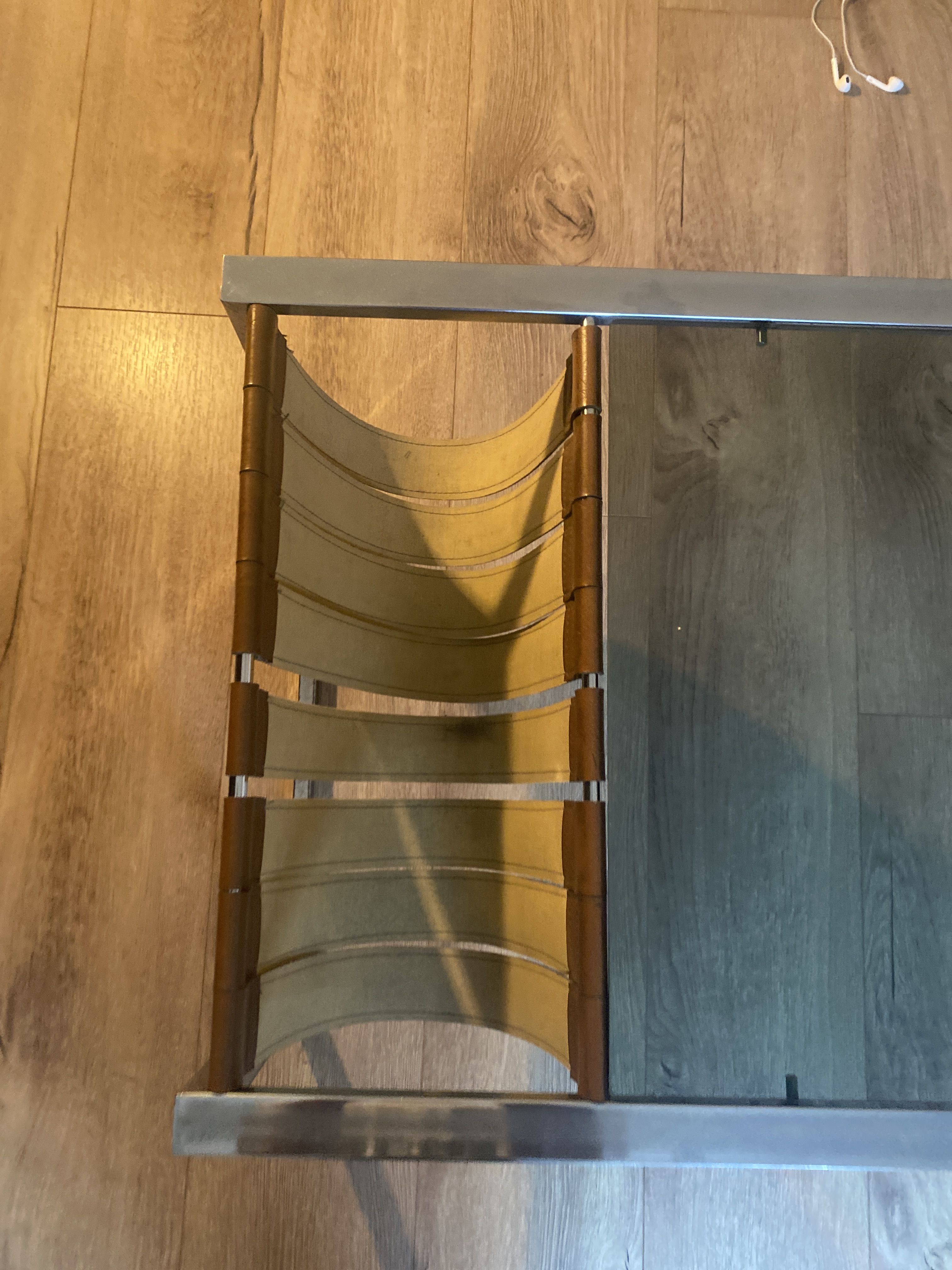 Stainless steel and glass coffee table with revised door with leatherette straps design 1970