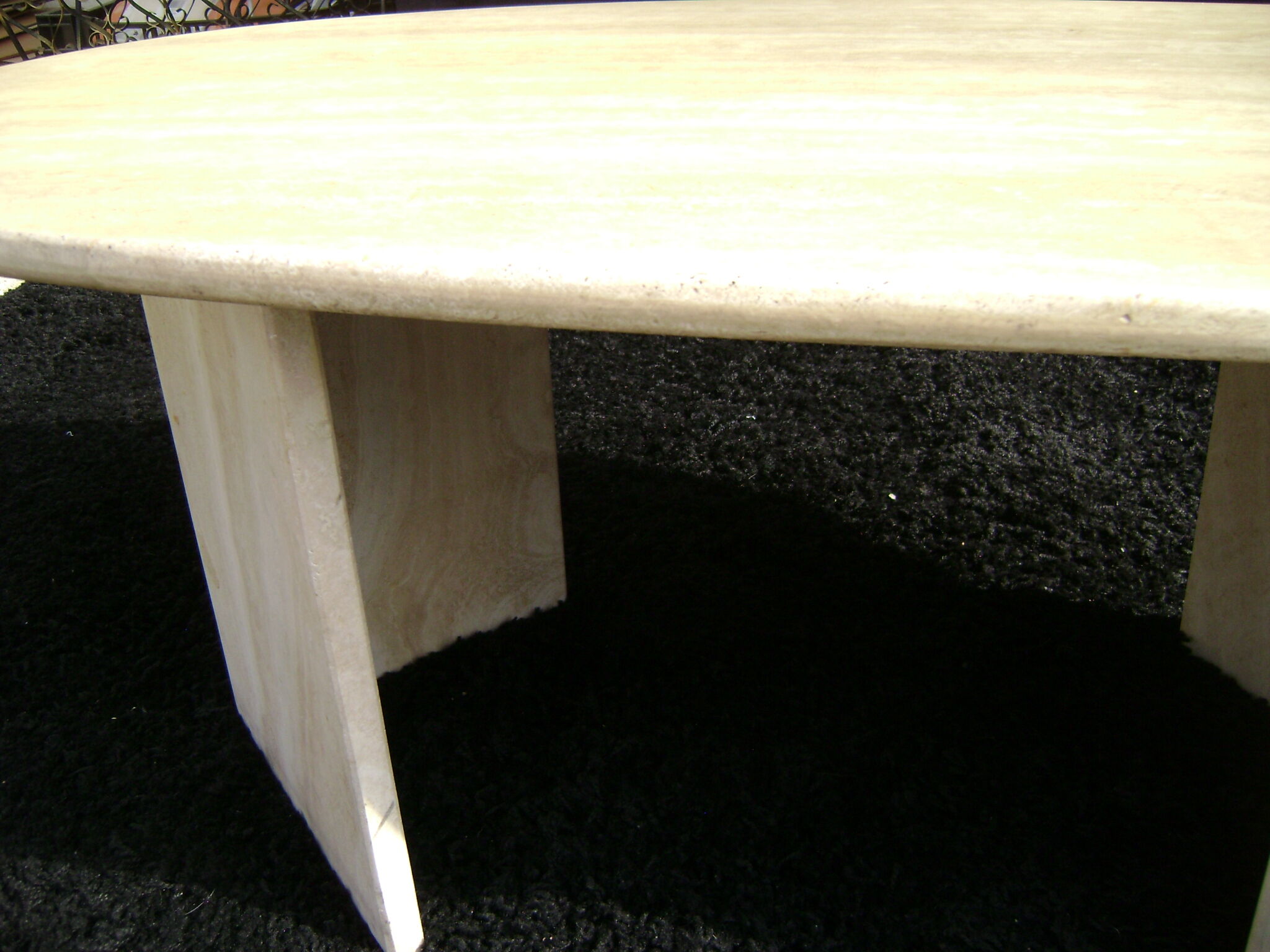 Oval coffee table in travertine italy from the 1970s