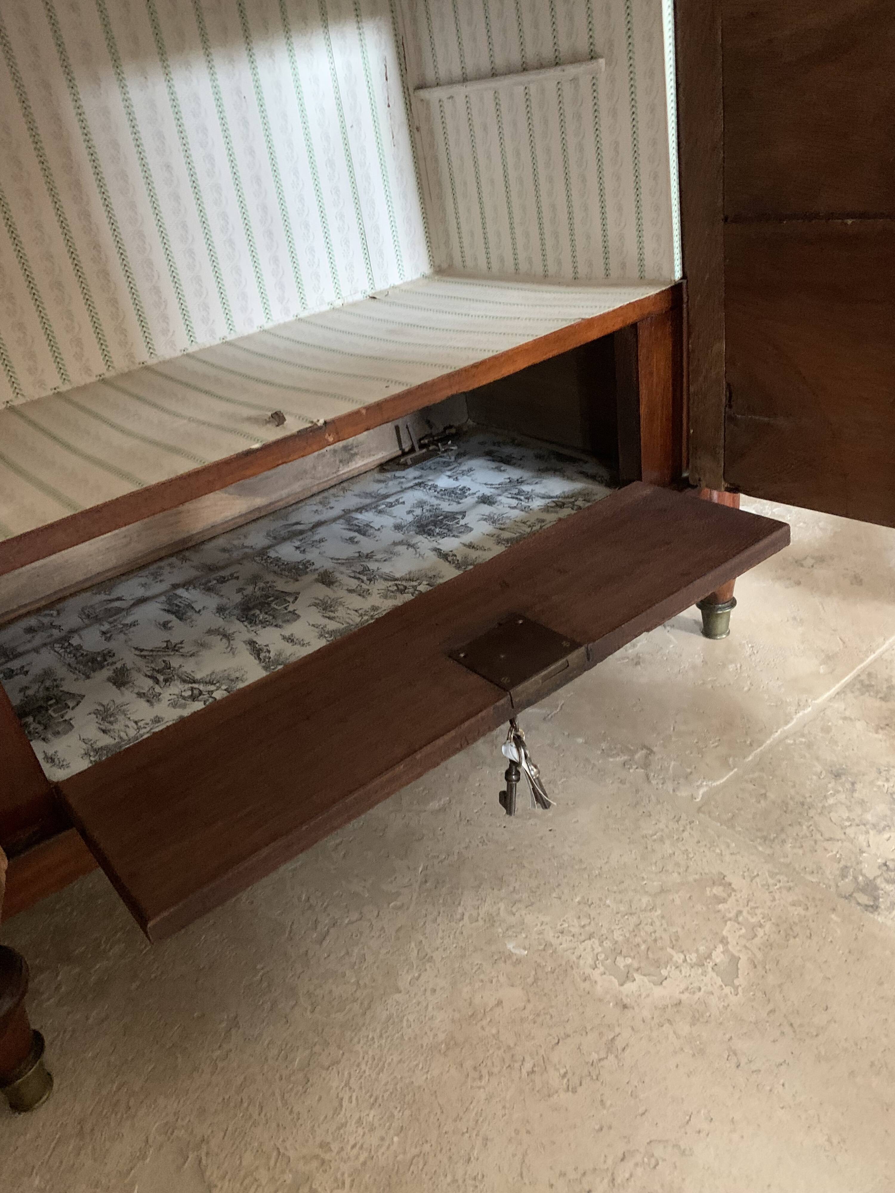 Louis XVI period secretary, in mahogany and Sainte Anne marble, 18th century