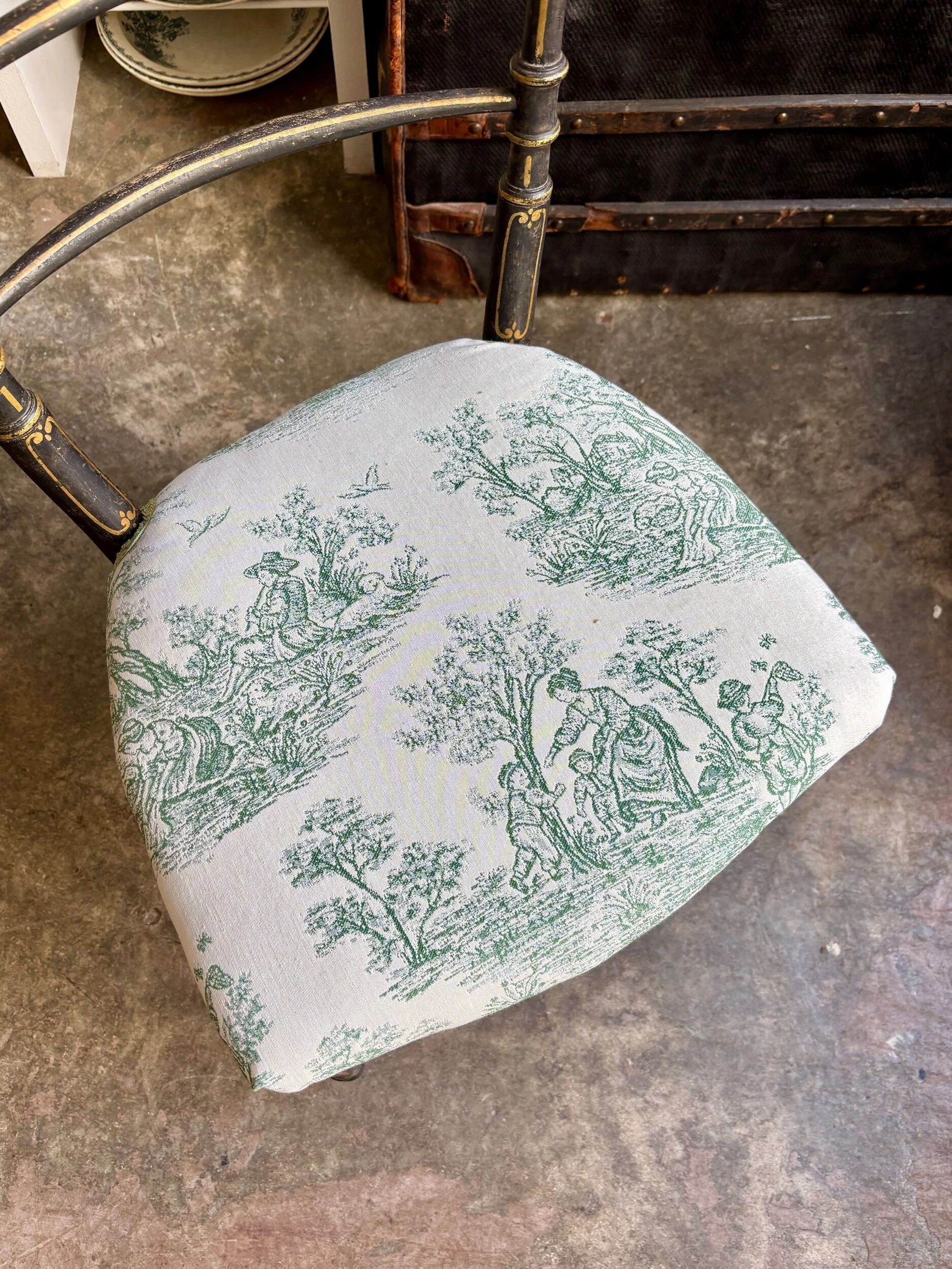 Napoleon III chair in blackened wood and green toile de Jouy.
