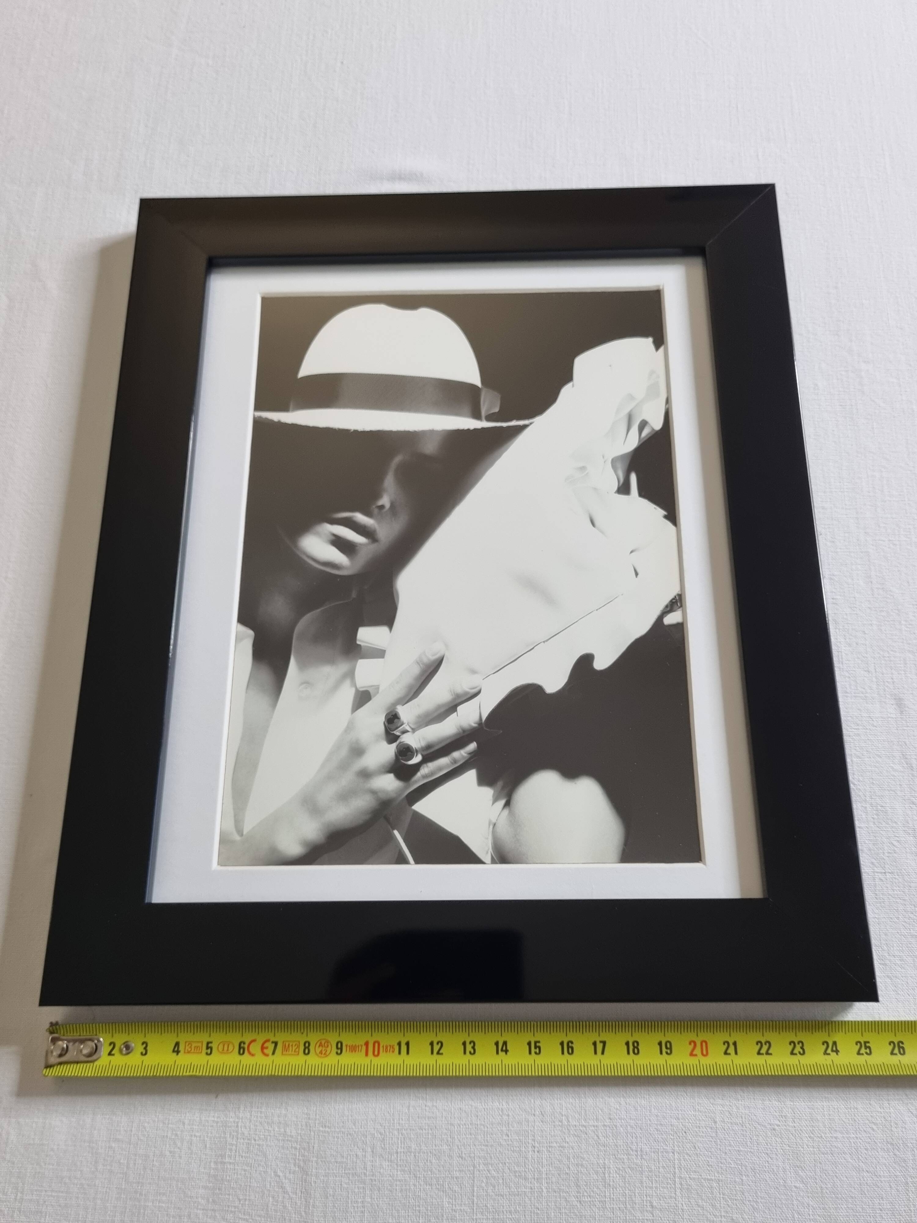 Framed black and white press photograph after Karl Lagerfeld, 30 x 26 cm
