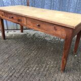 Antique solid cherry farmhouse table with 2 front drawers.