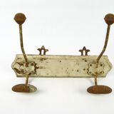 Double patere with "fleur de lys" support