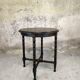 Vintage gueridon with beaded wooden legs.