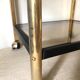 Serving with vintage wheels in metal and smoked glass