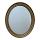 Old oval golden mirror