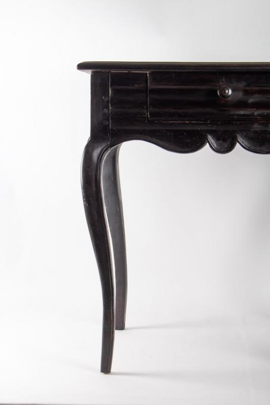 Office table from the early 19th century Louis XV style in blackened wood