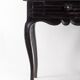 Office table from the early 19th century Louis XV style in blackened wood