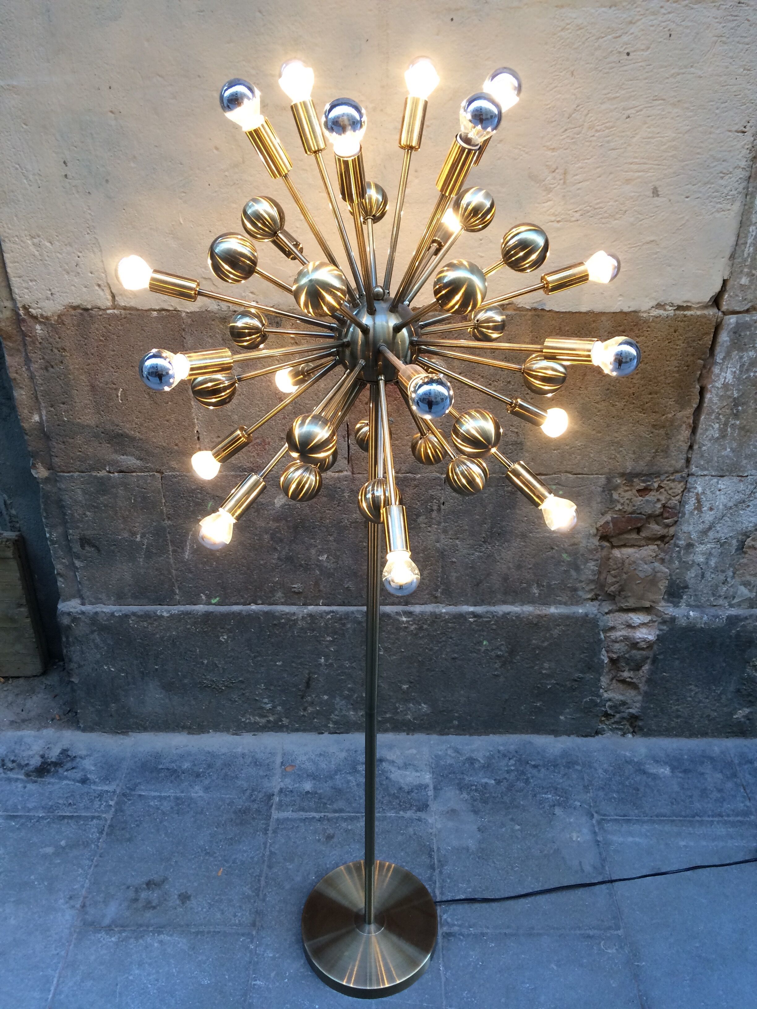 Floor lamp in gold metal of the 1960s