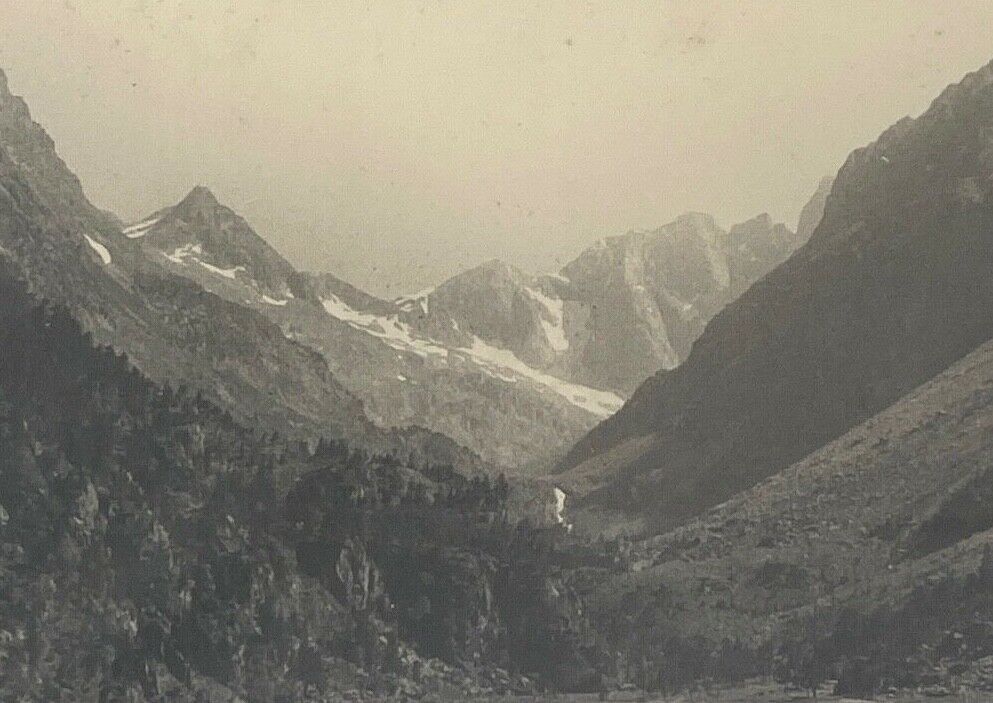 Photo in black and white mountain lake in golden frame