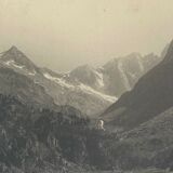 Photo in black and white mountain lake in golden frame