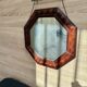 Octagonal mirror, glossy varnished oak, Art Deco.