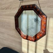 Octagonal mirror, glossy varnished oak, Art Deco.