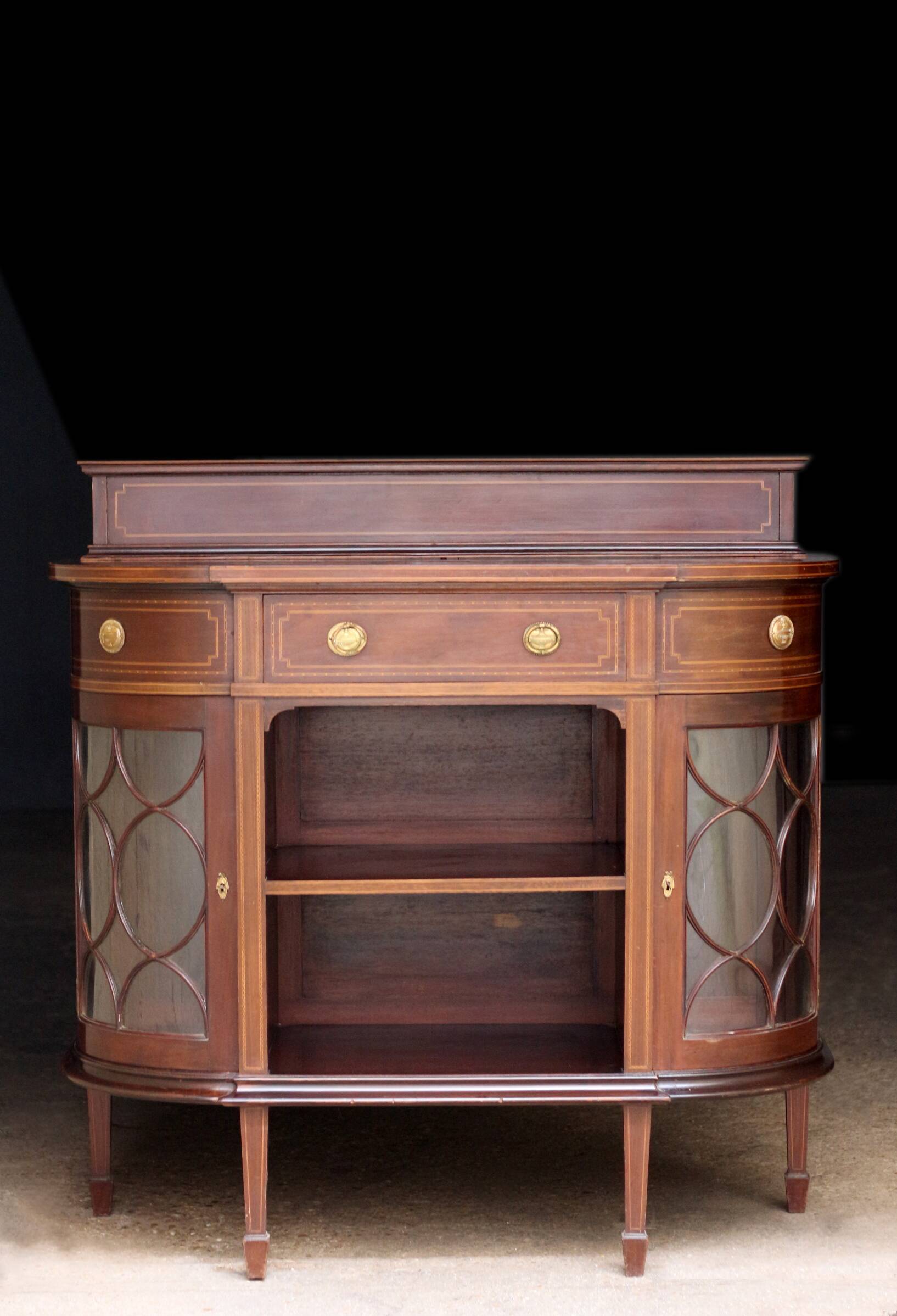 Elegant console by waring & gillow ltd, in mahogany veneer.