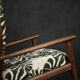 Mid-century modern Danish rocking chair in wood and fabric with Monstera leaf pattern, 1960s.