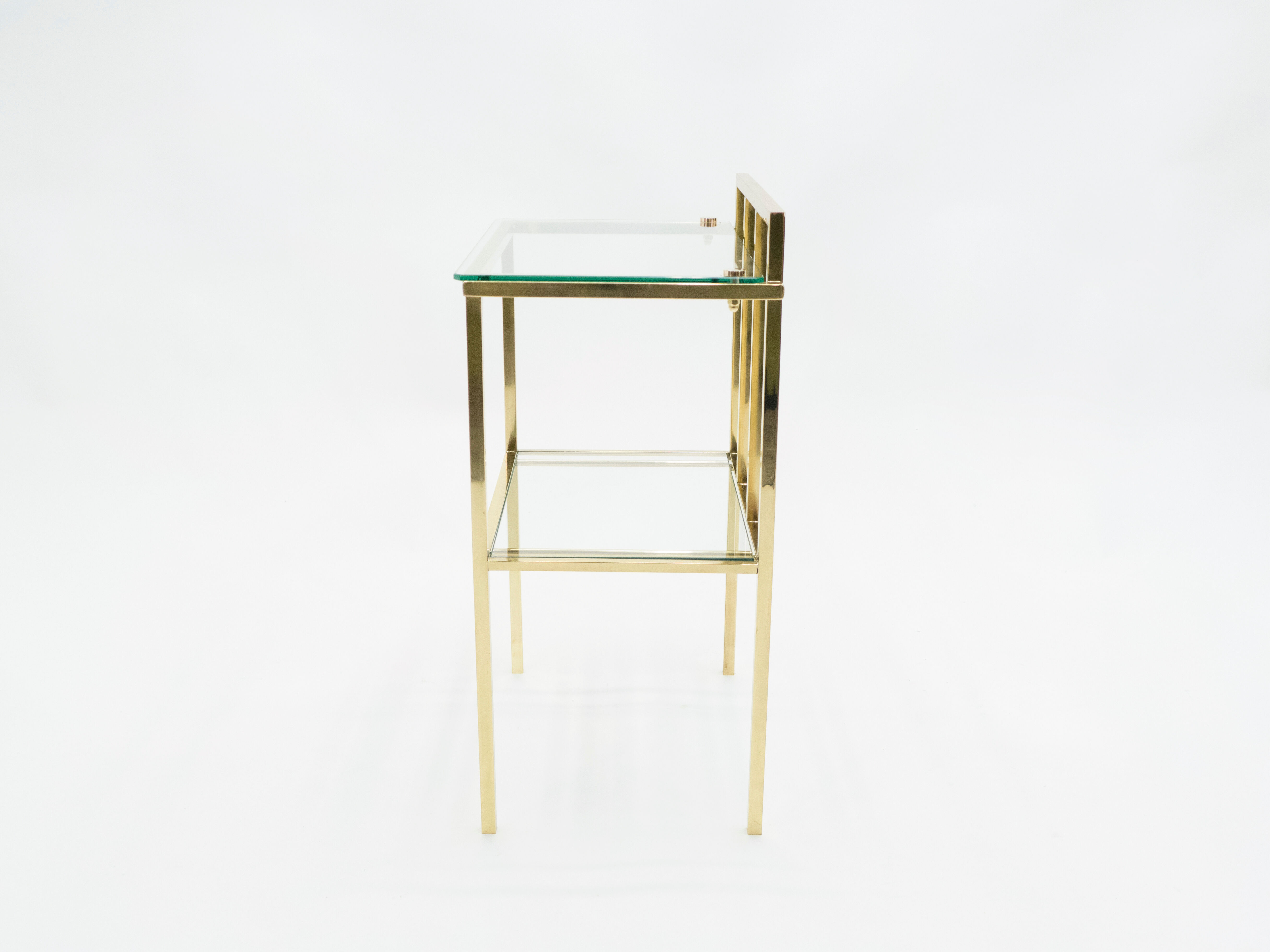 Pair of sofa tables in glass and brass 1960s