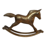 Rocking horse in gilded brass vintage